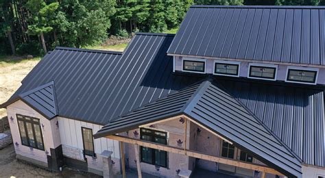 black metal roof houses|black matte standing seam metal.